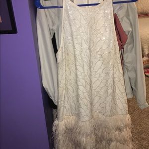 Beaded and feather bottomed cocktail dress